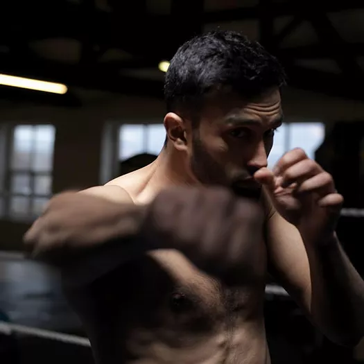 Picture of Adil Anwar practicing boxing